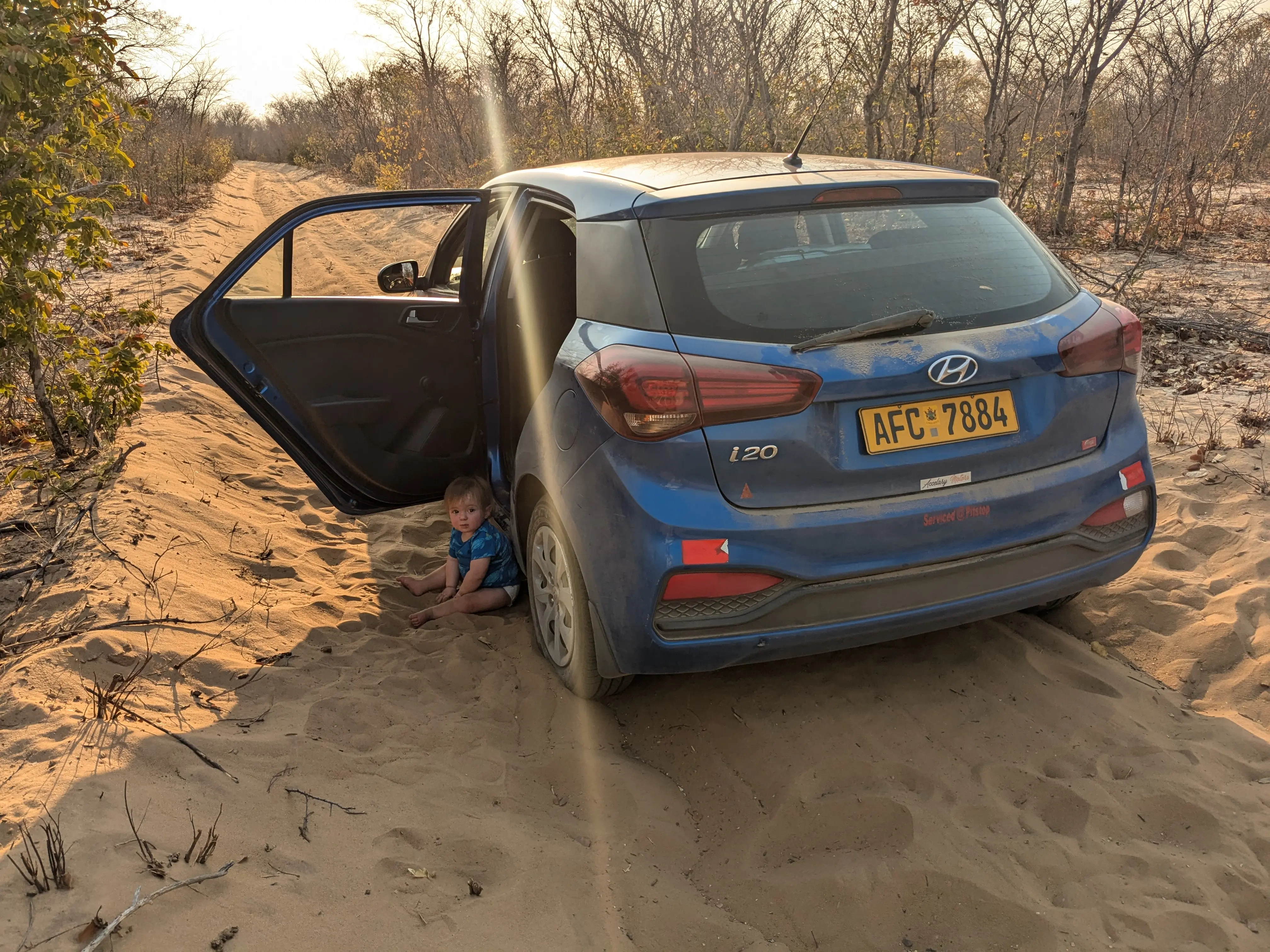 Sonja tries her best to dig our car out of the sand